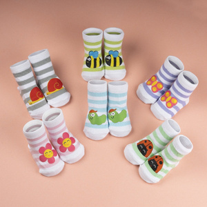 Colorful SOXO baby socks with a caterpillar